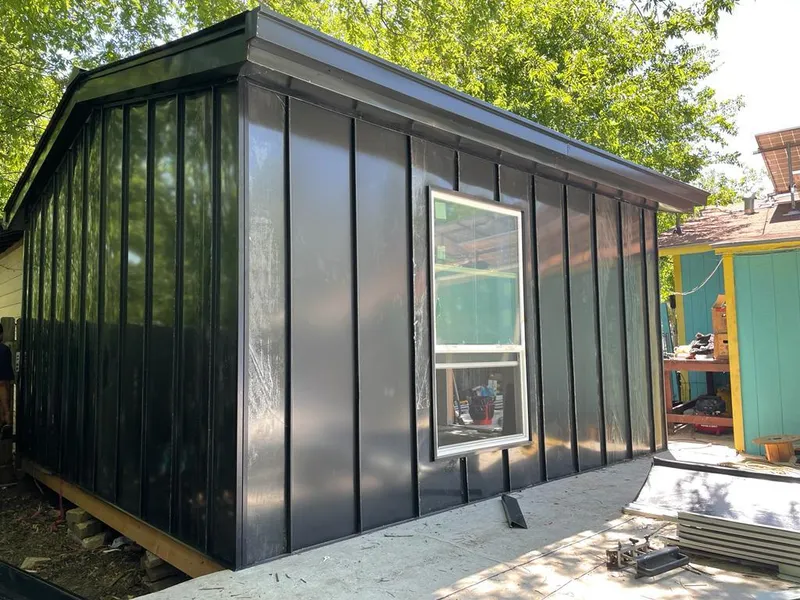 Black standing seam metal wall panels for Roof Inspection in Virginia