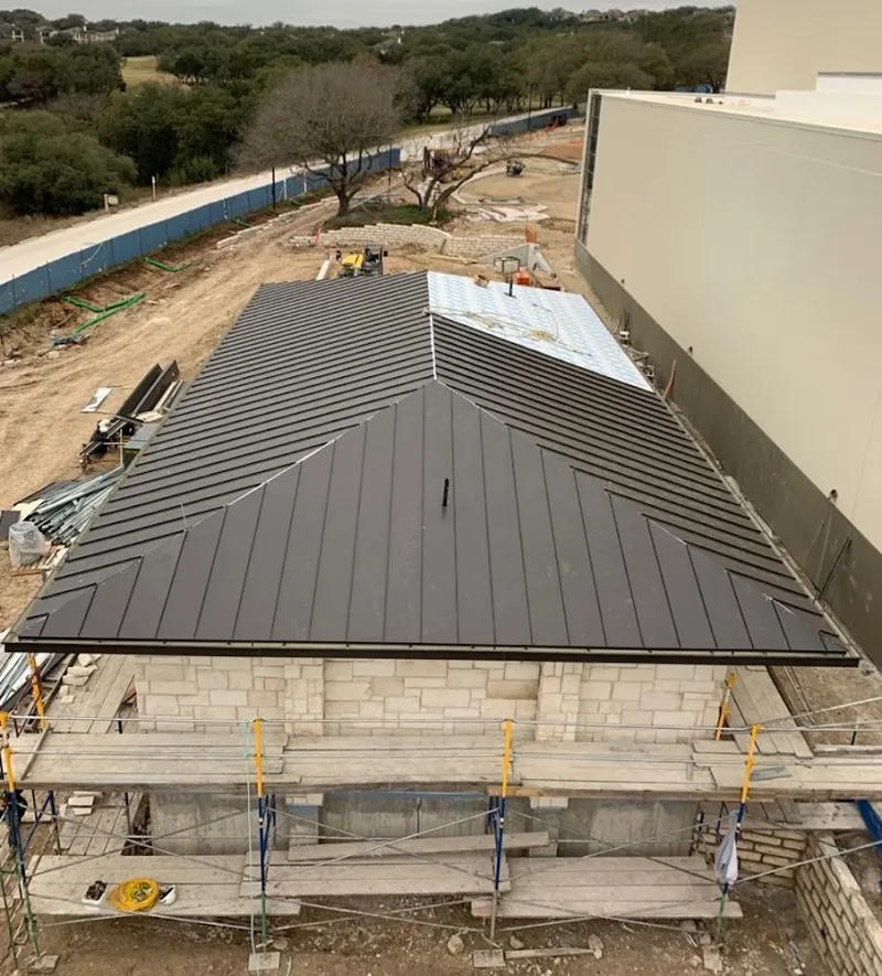 Metal roof new construction with scaffolding in Virginia